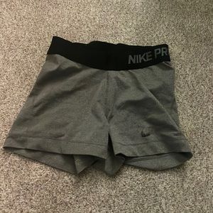 Worn grey Nike pros